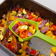 Joseph Joseph small scoop colander 30cm in green, a draining scoop and slotted serving spoon.