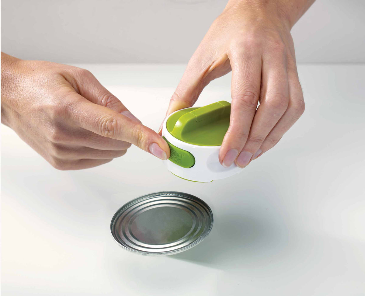 The Can-Do can opener held in one hand, showing how compact it is.