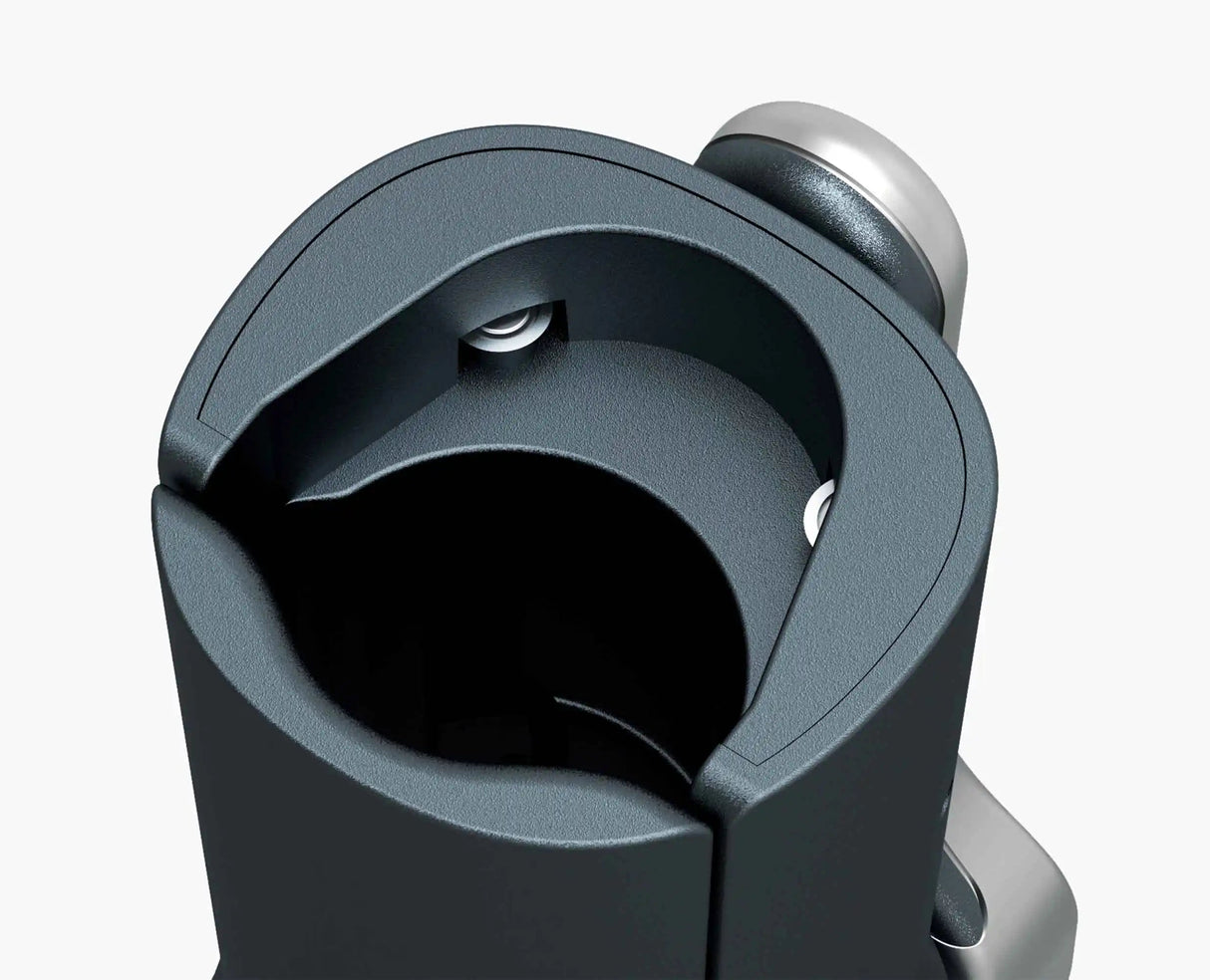 The corkscrew alongside the included spare screw.