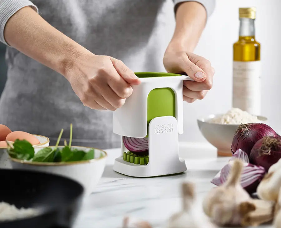 ChopCup with the lid lifted to show the stainless-steel blades.
