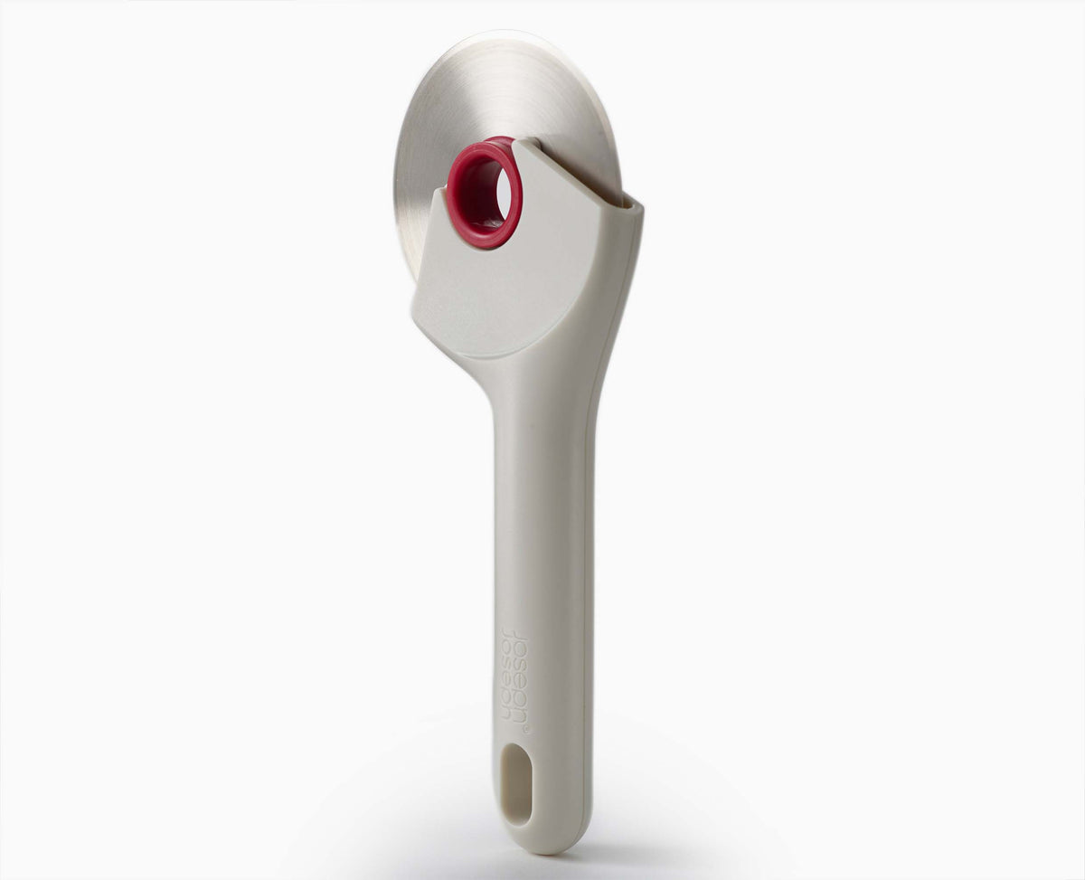 Joseph Joseph Ringo pizza cutter in stone and red ergonomic handle detail, Homelux Kenya