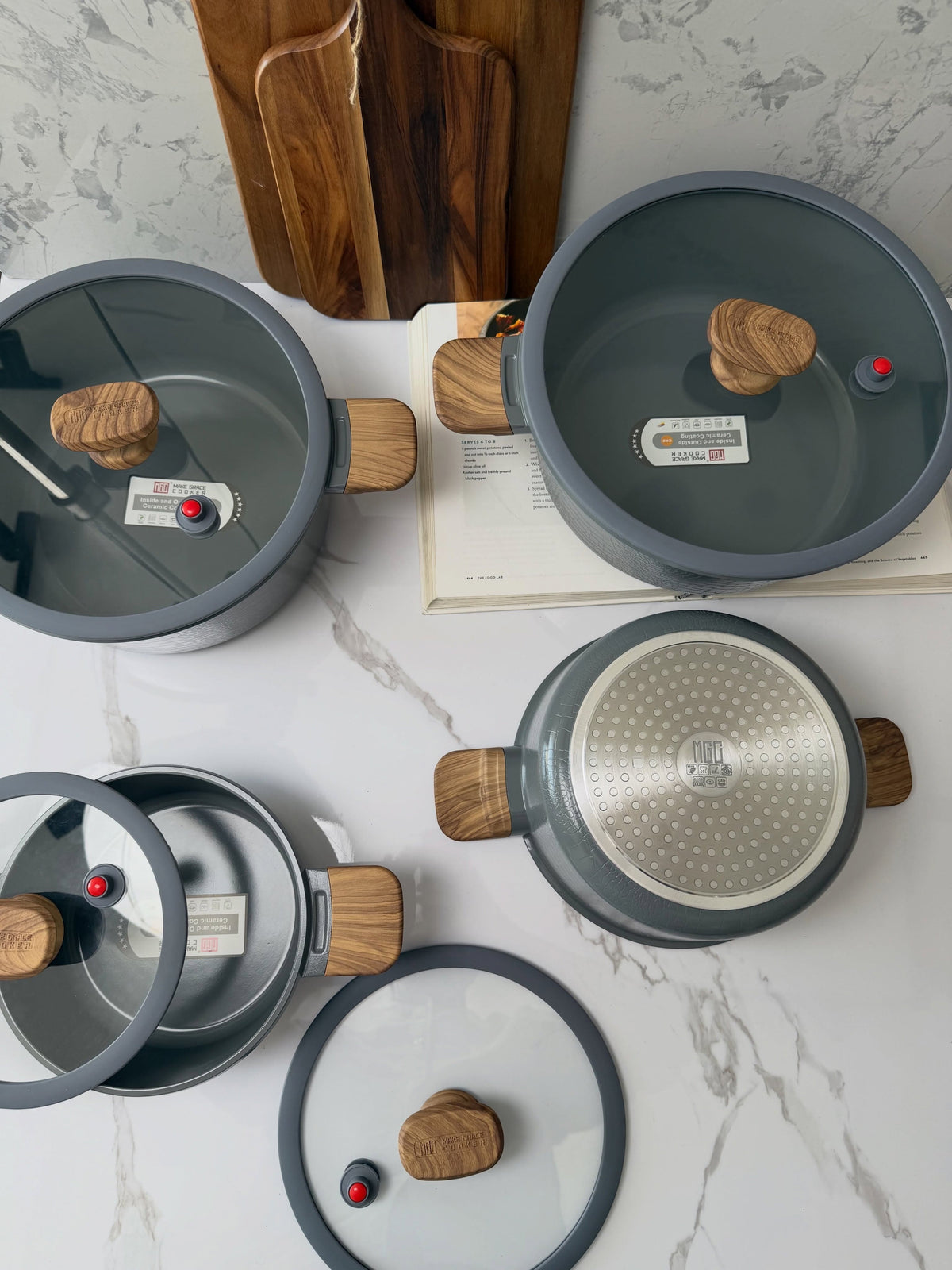 MGC Crocodile grey casseroles with lids off showing the ceramic interior