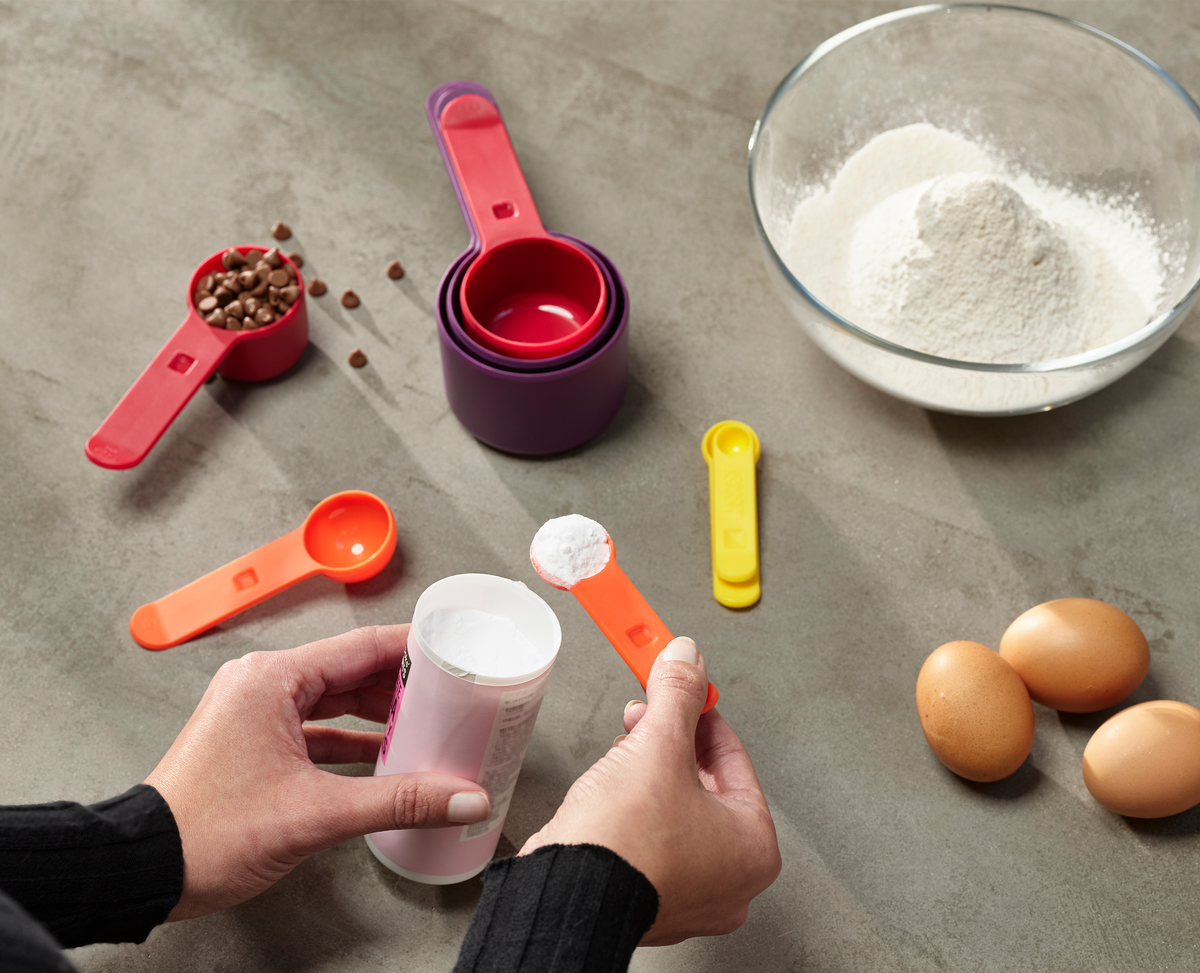 The Nest Measure cups shown separated by size.