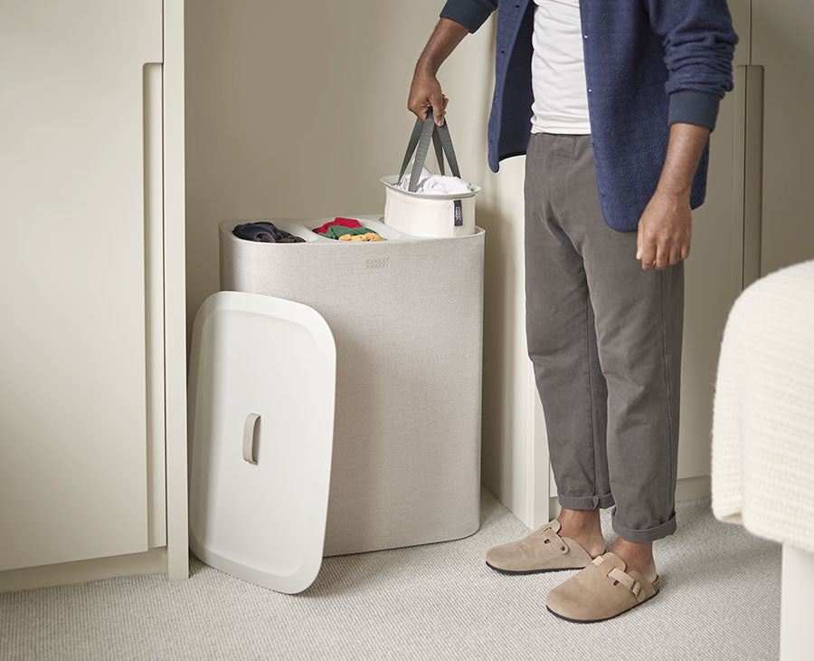 Lid removed to show three 30-litre tote bags sitting side by side in the frame.