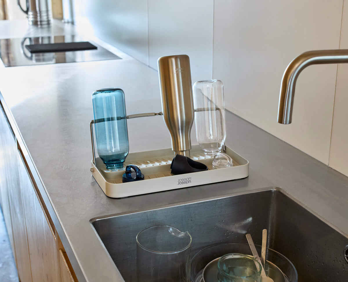 Joseph Joseph DrySmart folding bottle drying rack in stone, sold in Kenya by Homelux Kenya