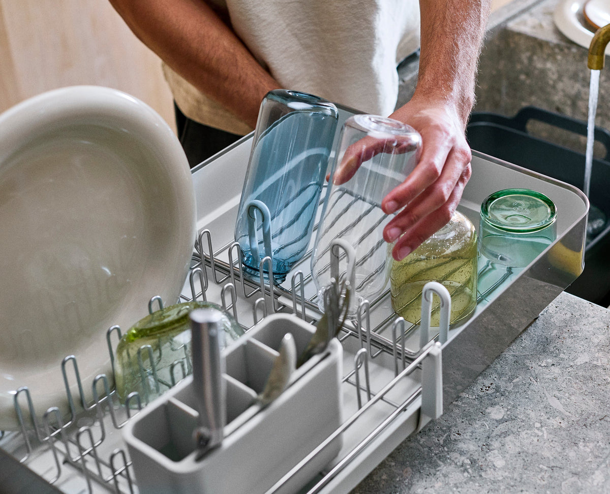 Joseph Joseph Extend Steel Plus expandable dish rack in stone integrated spout draining into the sink, Homelux Kenya