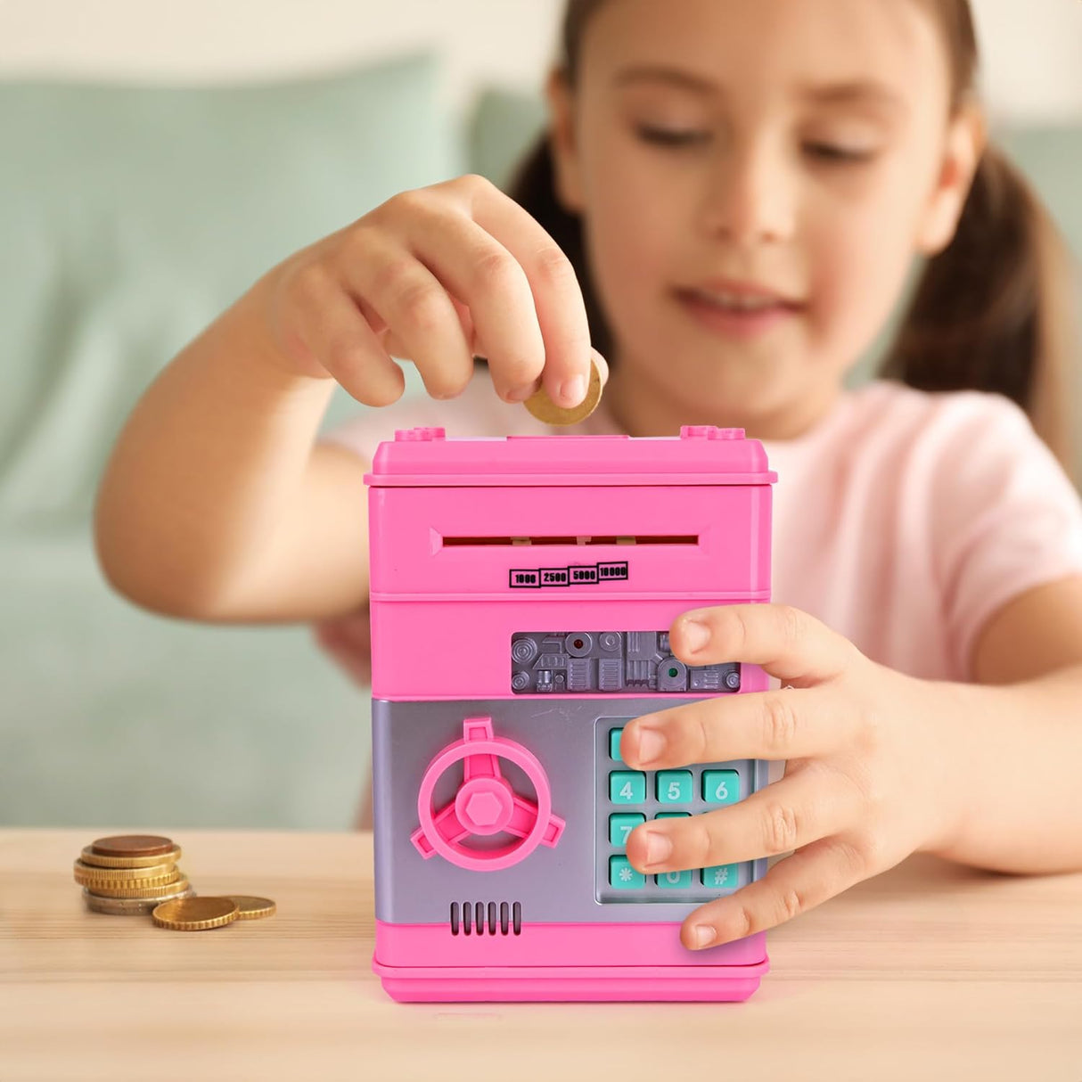 Electronic kids saving piggy bank.
