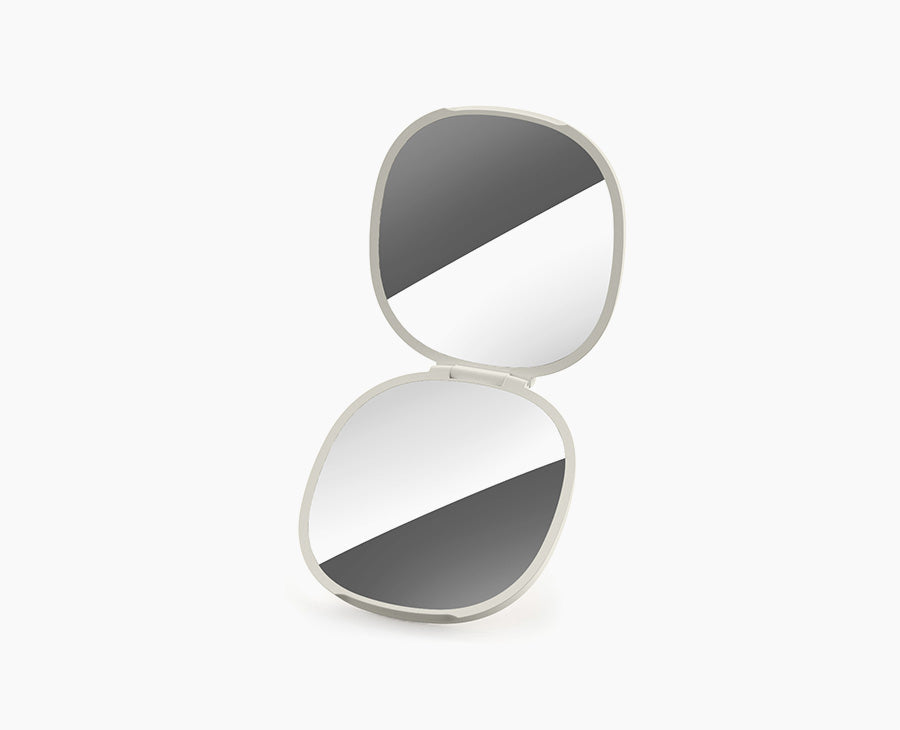 Joseph Joseph Viva 2-in-1 compact mirror in Shell, closed.