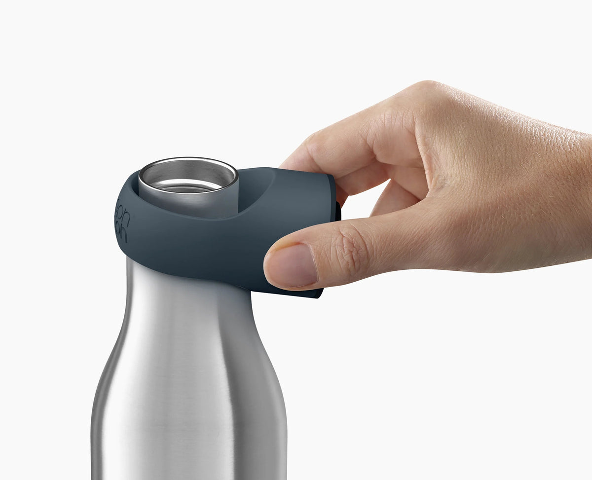 Joseph Joseph stainless steel bottle and mug set in use