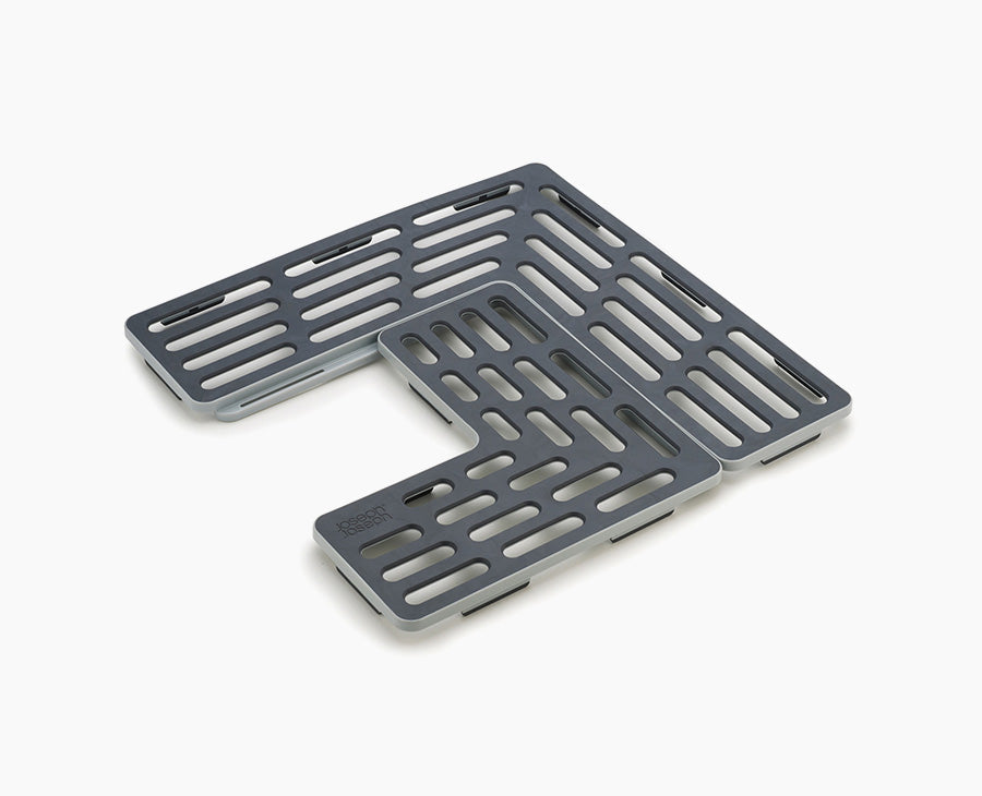 Joseph Joseph Sink Saver adjustable sink mat in grey, seen from above.