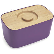 Joseph Joseph melamine bread bin in aubergine with beech wood lid, shown closed.