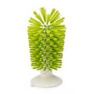 Joseph Joseph Brush-Up in-sink washing-up brush in green.