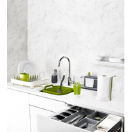 Further product view of the green Joseph Joseph Brush-Up in-sink washing-up brush.