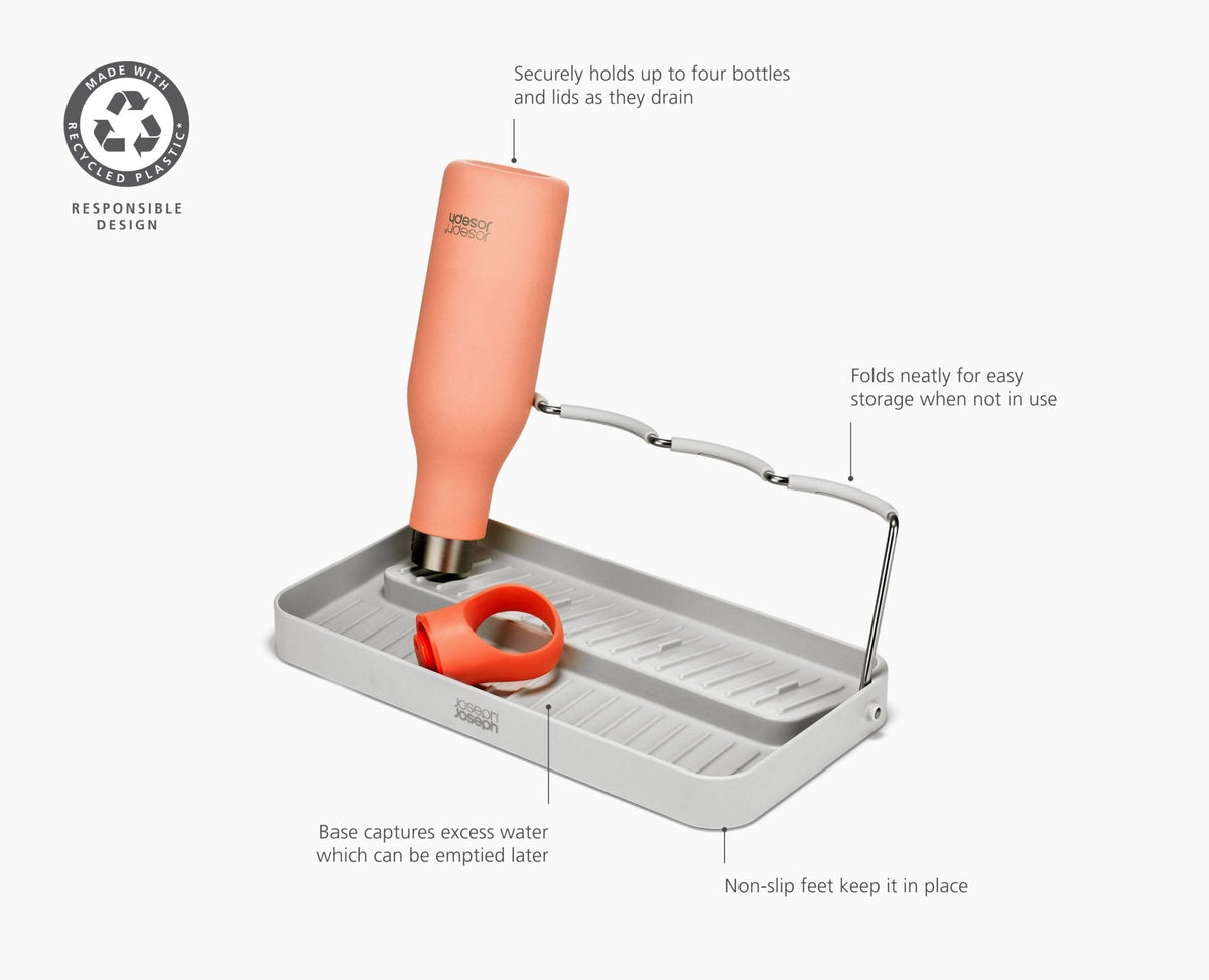 Joseph Joseph DrySmart folding bottle drying rack in stone on a kitchen counter beside the sink, Homelux Kenya
