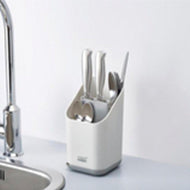 Second view of the Joseph Joseph Duo draining basket showing its pouring spout.