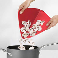 Folding action of the red Joseph Joseph Duo chopping board, third product image