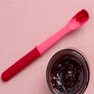 Elevate long-handled jar spoon shown on its weighted tool rest.