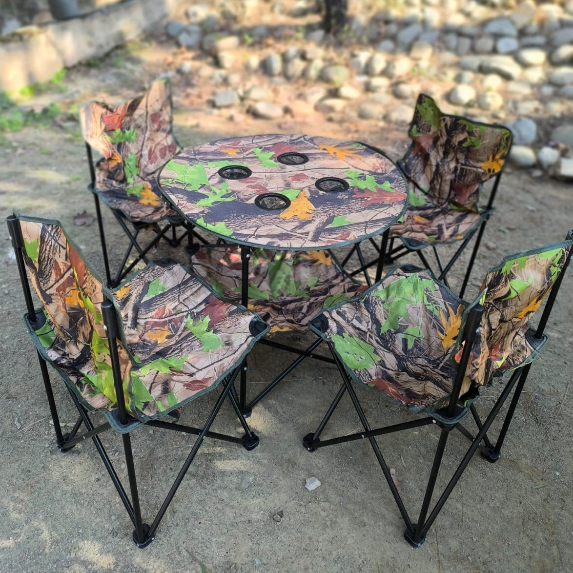 A SET OF FOUR CHAIRS AND A TABLE