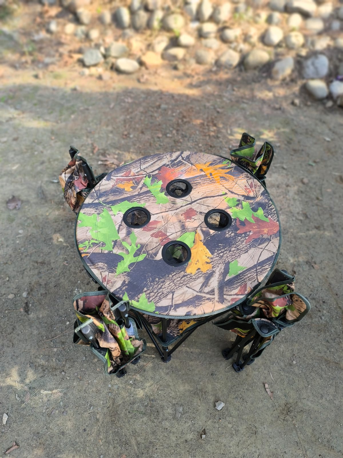 A SET OF FOUR CHAIRS AND A TABLE