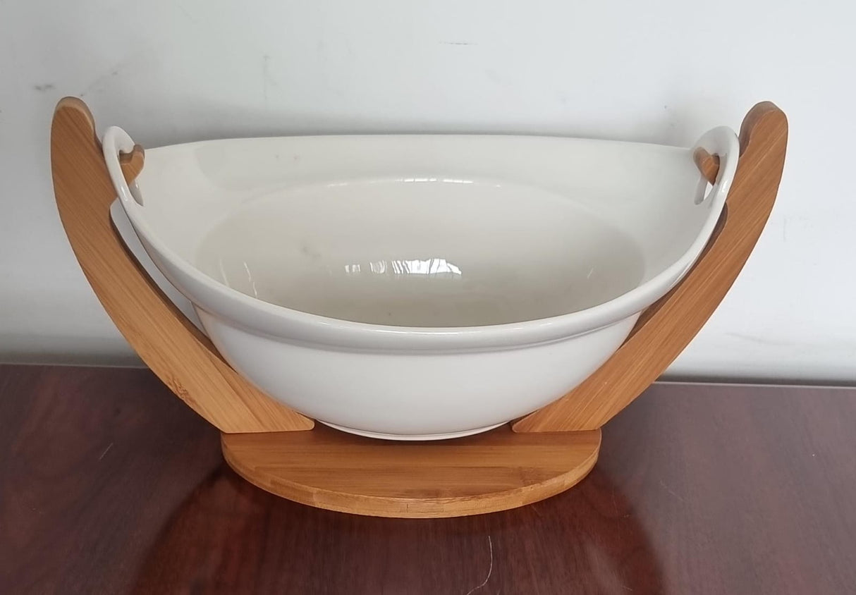 Ceramic fruit bowl on bamboo base