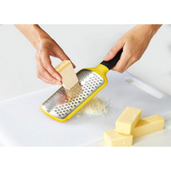 Joseph Joseph Multi-Grate paddle grater showing its coarse and fine blades, third product view.