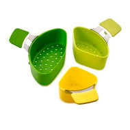 Second view of the Joseph Joseph Nest Steam 3-piece steaming pod set in green