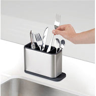 Joseph Joseph Surface cutlery drainer with its pouring spout, alternate view.