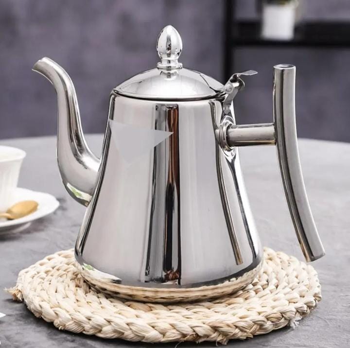 Stainless steel tea pot with infuser filter.