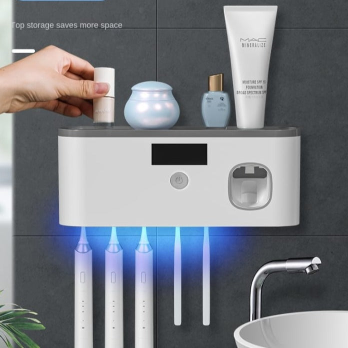 Electric toothbrush UV sterilizerilizarion dispenser.