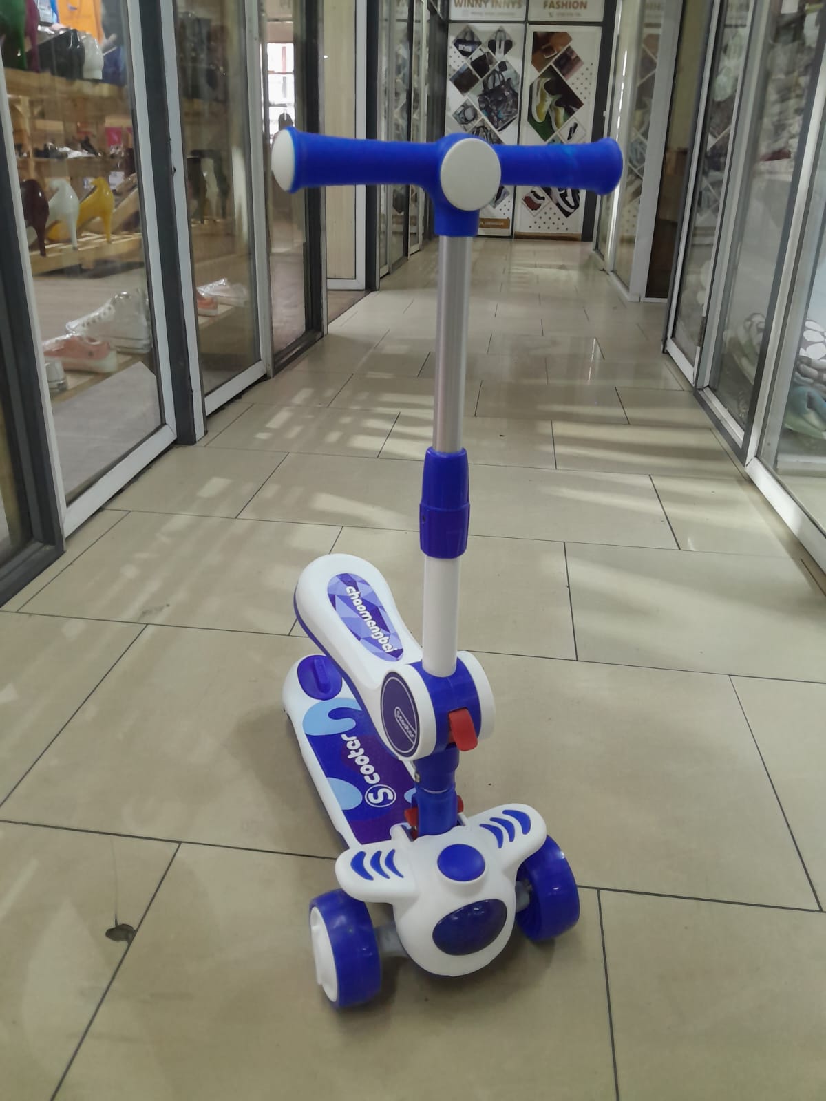 Kids scooter with a seat