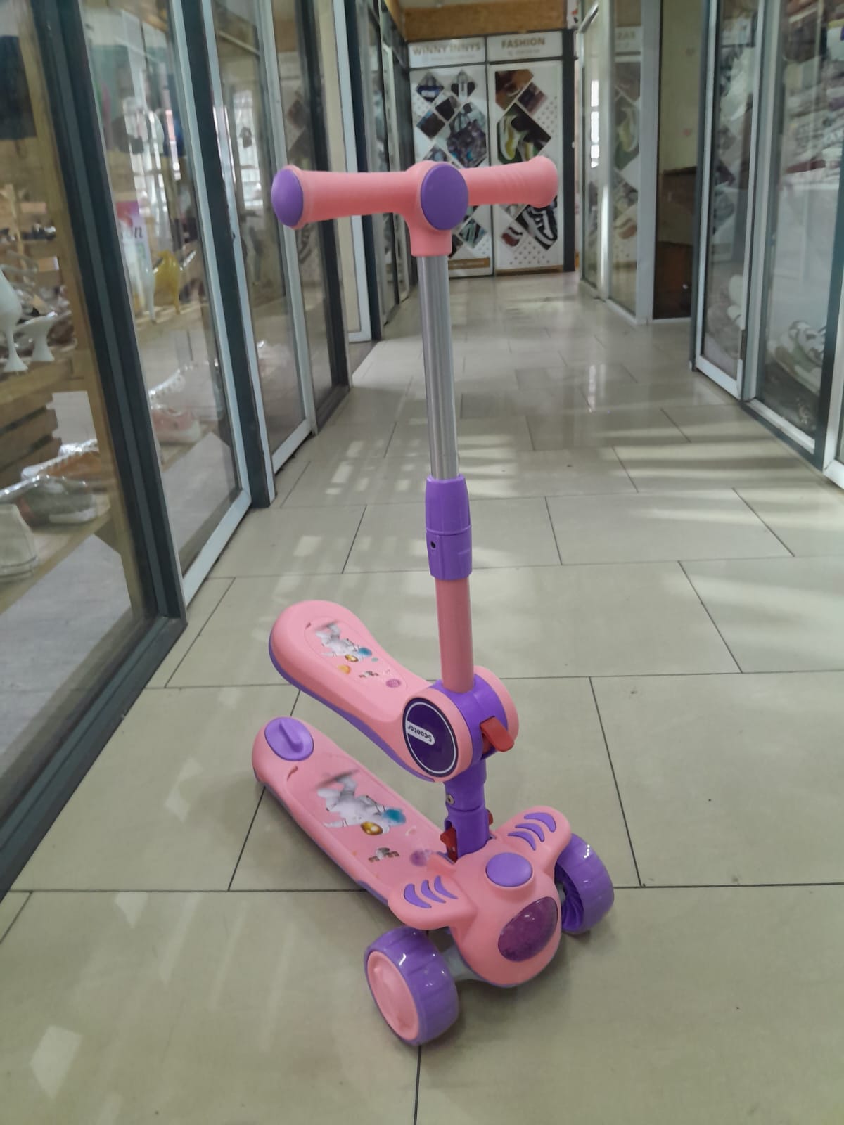 Kids scooter with a seat