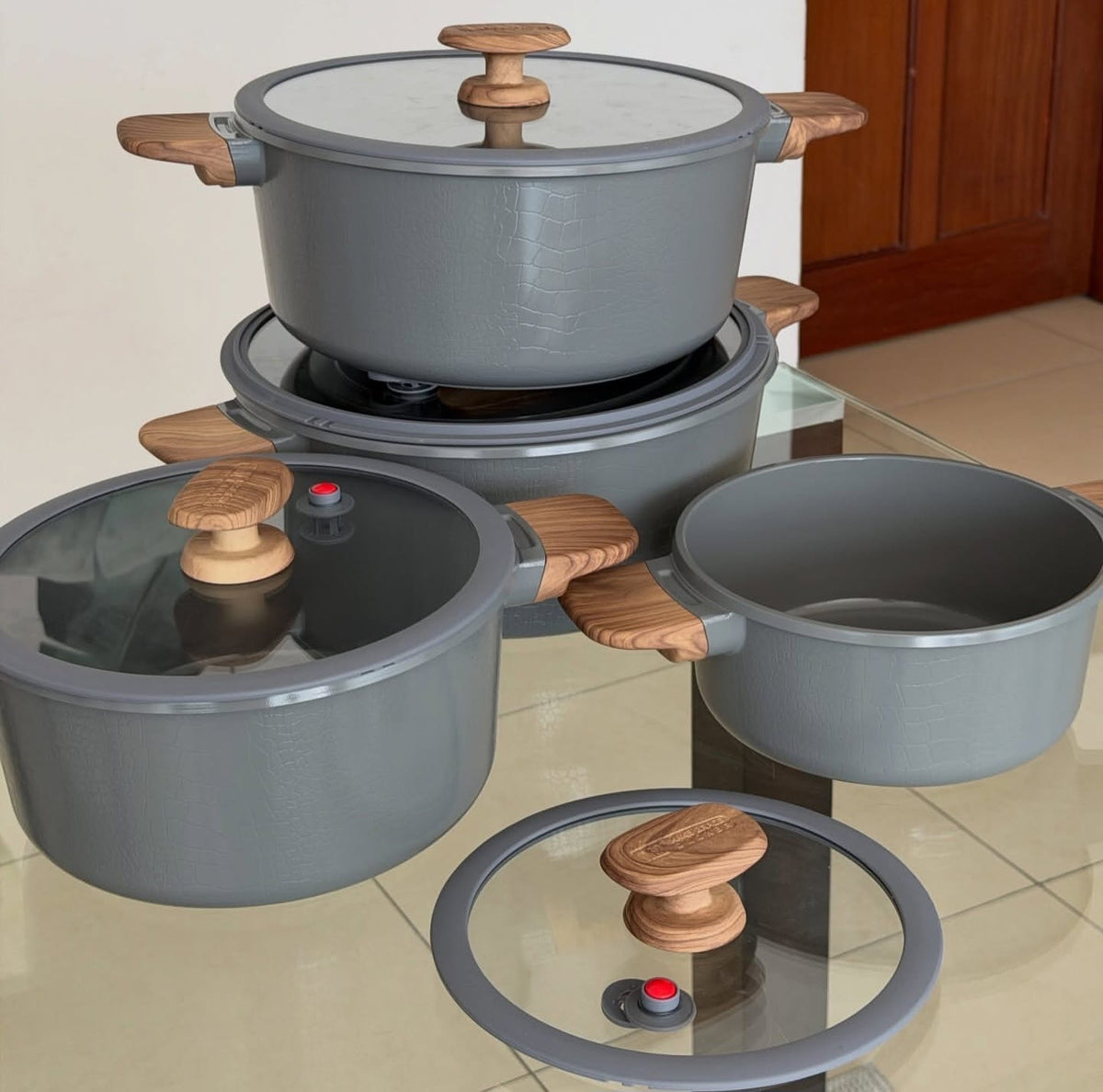 MGC Crocodile grey casseroles with glass lids and wooden handles