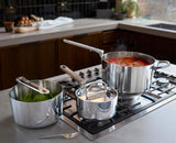Joseph Joseph Space Steel saucepans stacked with handles folded for compact storage