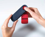Hand gripping the Rota sharpener by its easy-grip handle on a worktop