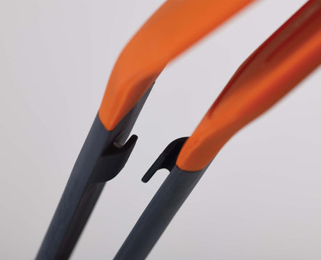 Turner Tongs being used to turn food in a frying pan