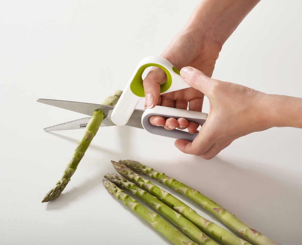 Detail of the blade notch used to grip stems and round items while cutting