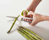 Detail of the blade notch used to grip stems and round items while cutting