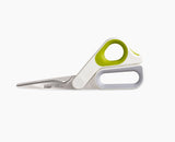 The integrated herb stripper on the PowerGrip handle in use