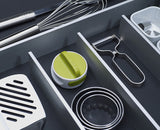 The Can-Do opener seated on top of a closed tin, ready to be twisted.