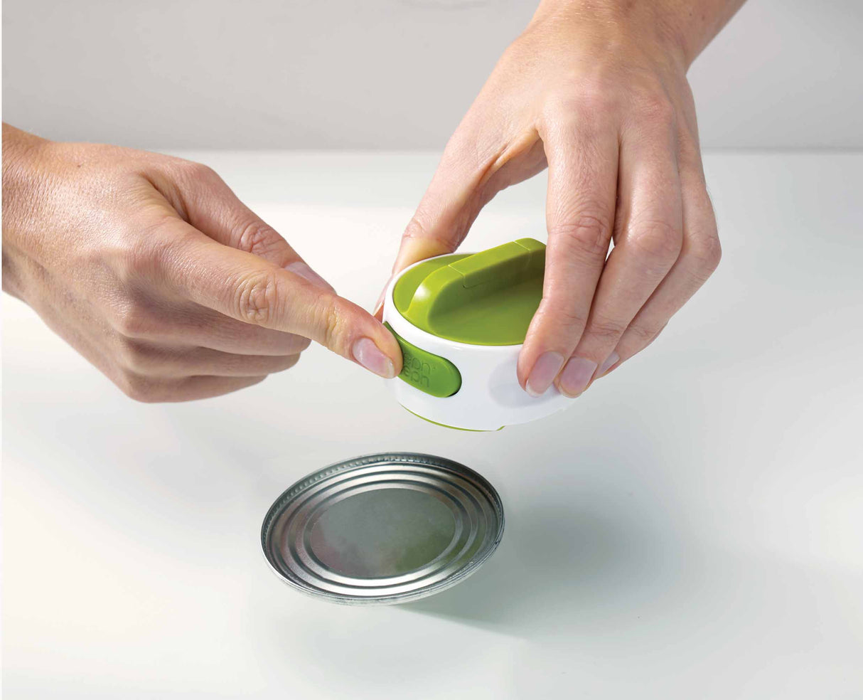 The Can-Do can opener held in one hand, showing how compact it is.