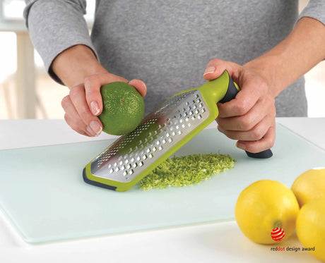 The grater handle twisted to 90 degrees for extra support during heavy grating.
