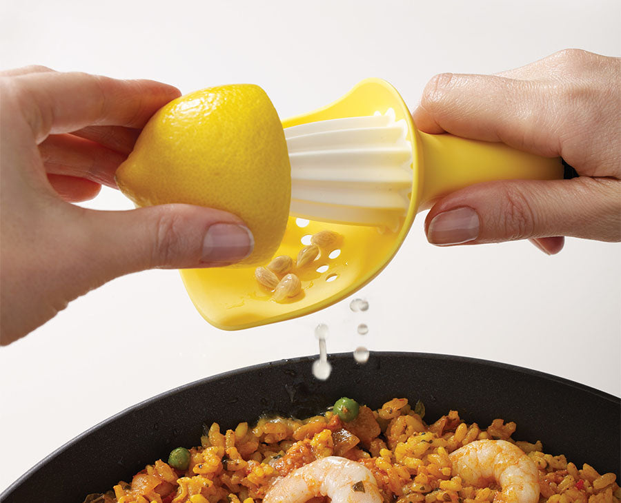Catcher citrus reamer showing the flexible cup that traps pips and pulp