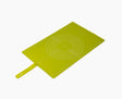 Joseph Joseph roll-up silicone baking mat in green, shown flat from above.