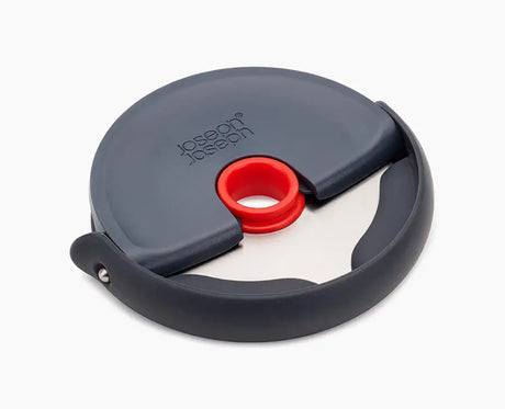 Joseph Joseph Disc easy-clean pizza wheel in grey with a red silicone blade guard.
