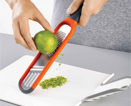 The protective sheath fitted over the Handi-Grate blades for storage.