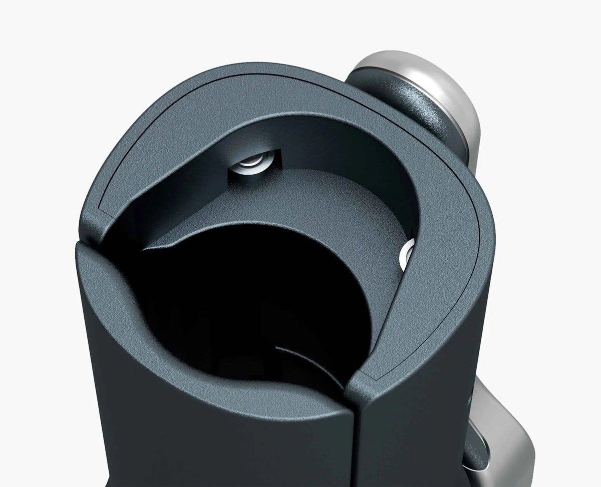 The corkscrew alongside the included spare screw.
