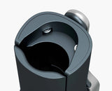 The corkscrew alongside the included spare screw.