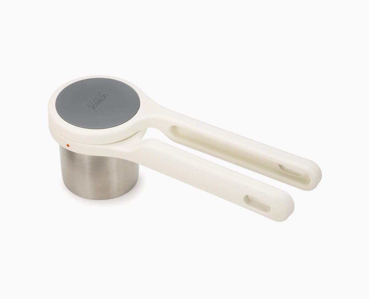 Joseph Joseph Helix potato ricer with the two pieces separated for cleaning
