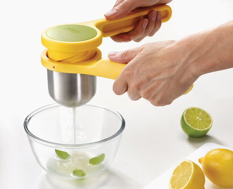 Joseph Joseph Helix citrus juicer in yellow juicing a lemon, Homelux Kenya
