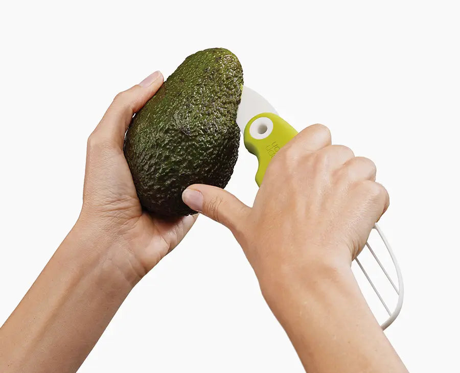 Joseph Joseph GoAvocado tool cutting an avocado with the folding blade, Homelux Kenya